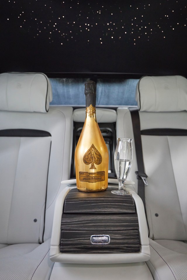 A chilled bottle of Ace Of Spades champagne shows off the drinks fridge 