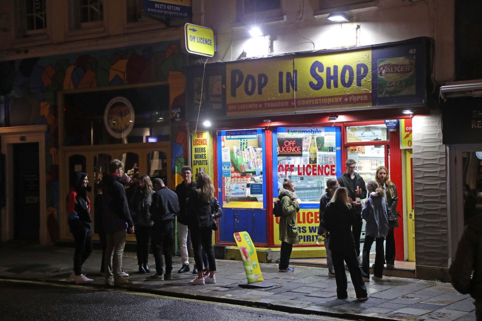 People keen to keep the night going have been queuing for extra drinks outside off-licences in Brighton