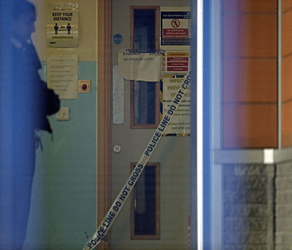 Police tape at the entrance to the custody suite