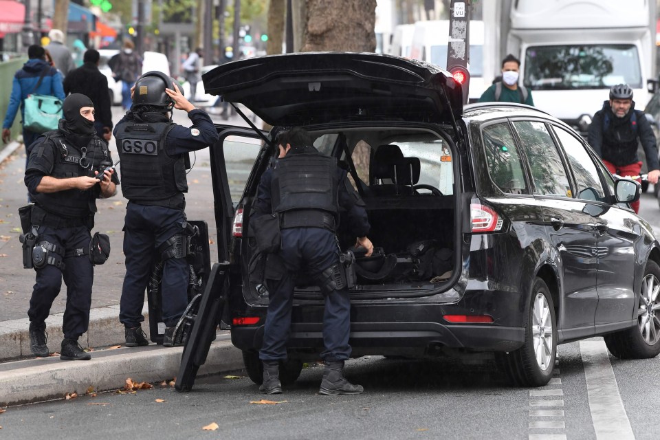 French police special forces kit-up near the former offices of the satirical magazine Charlie Hebdo 