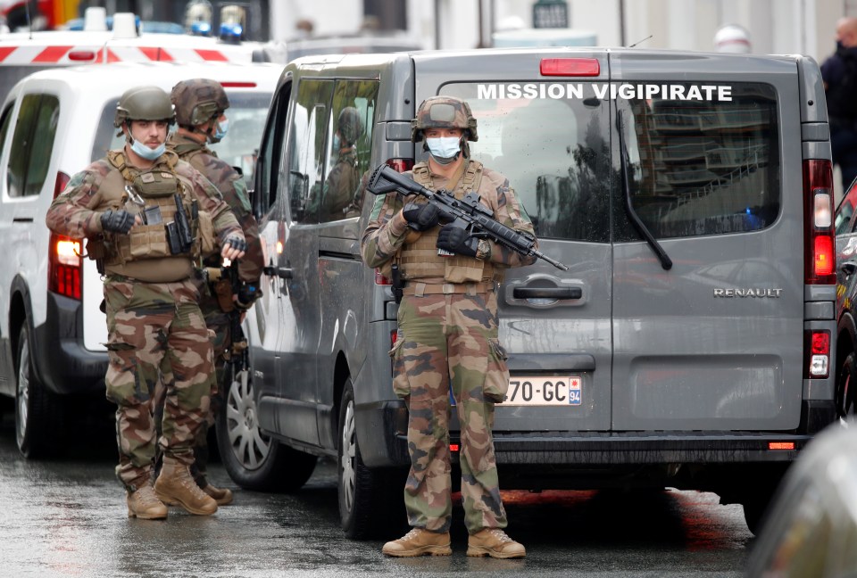 French soldiers armed with assault weapons