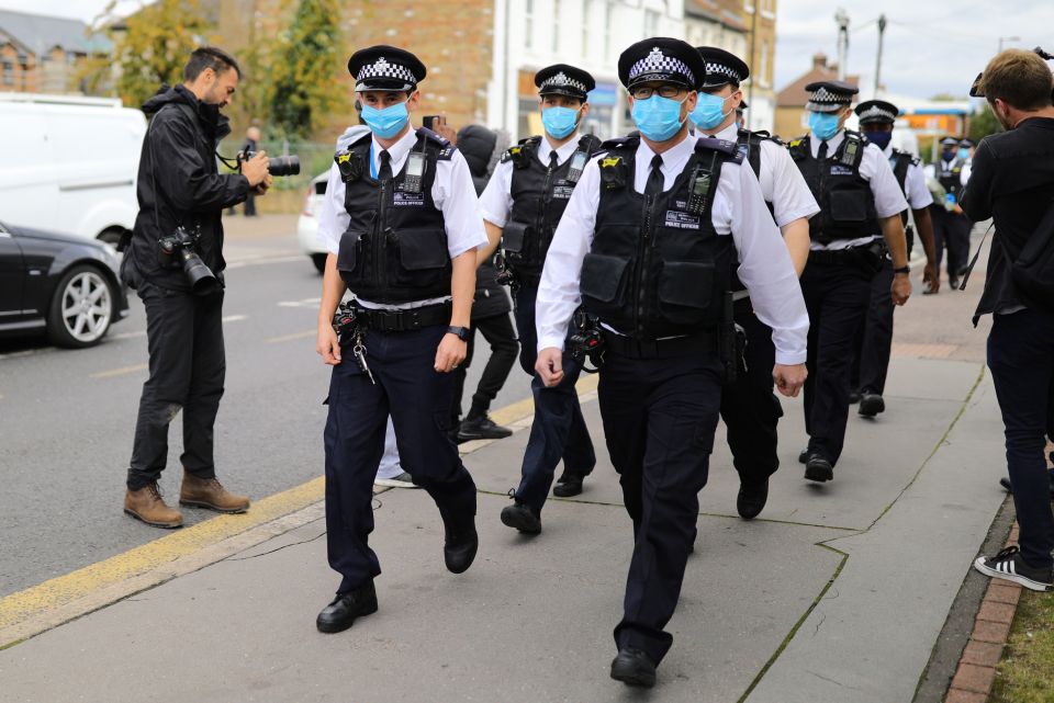 A group of officers marched to the scene to pay tribute