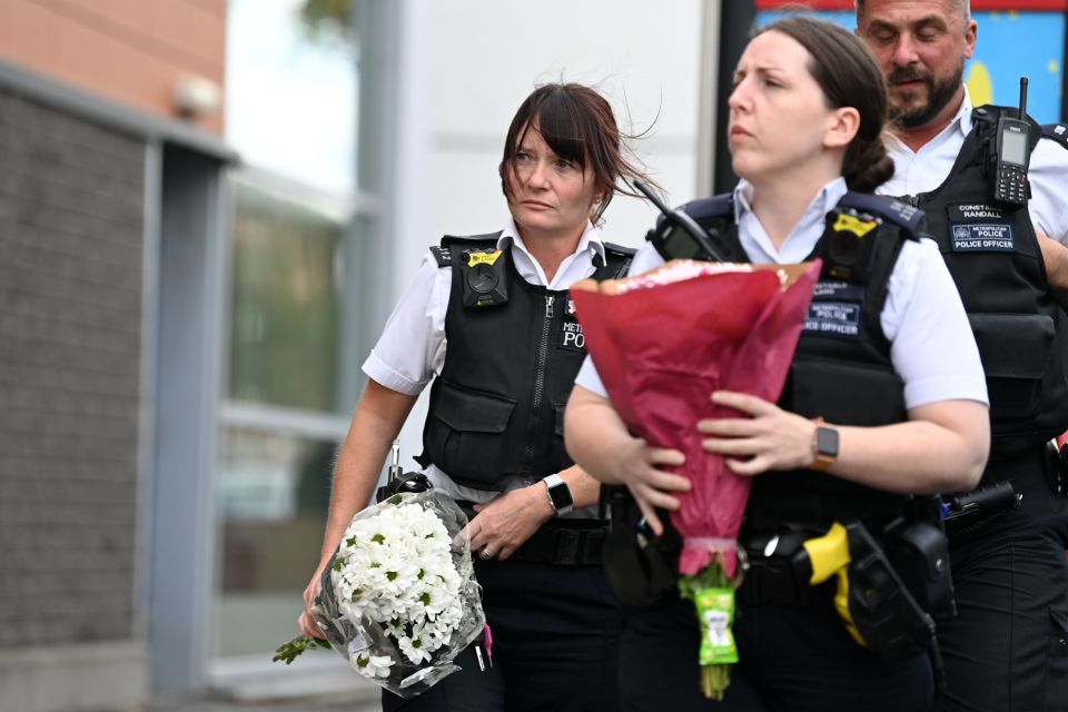 Emotional officers have come to lay flowers throughout the day