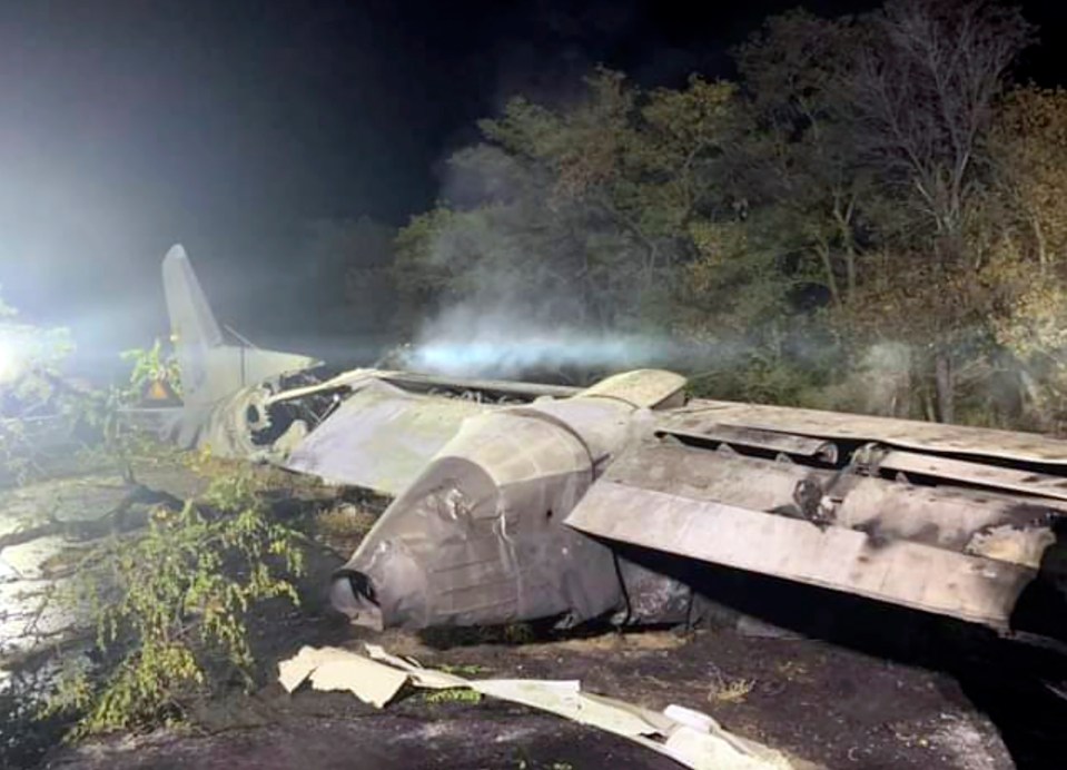 One of the An-26's wings lying on the ground