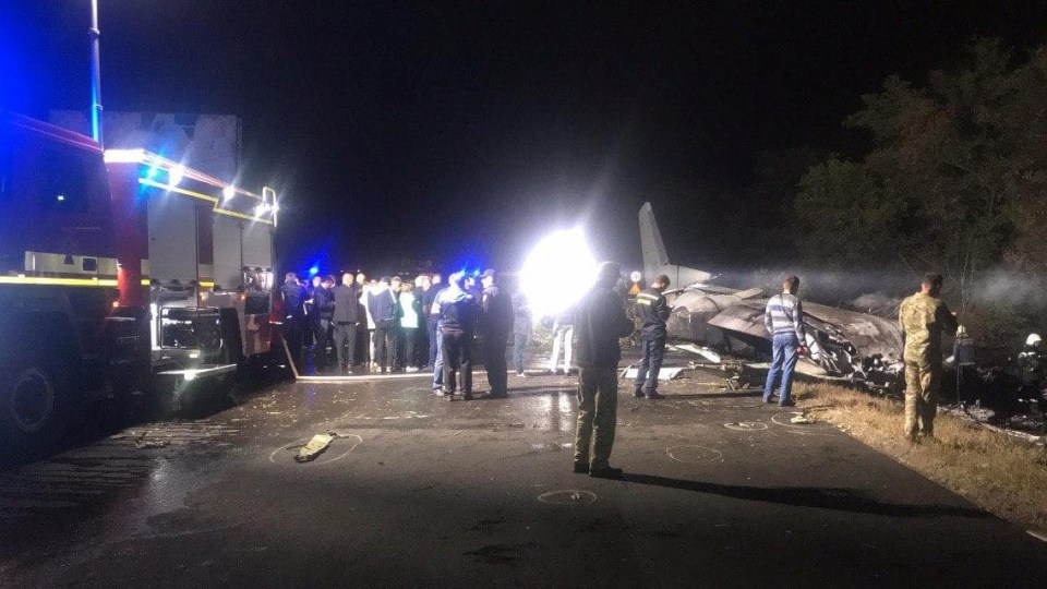 Part of the plane lying beside the road 