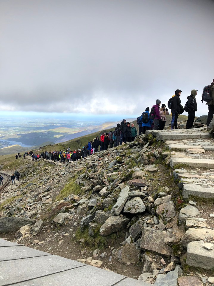 Hordes queue to reach summit of Snowdon despite pleas by Welsh Government to stay away