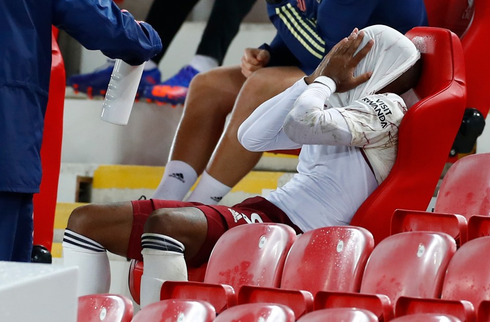 Lacazette needed consoling on the bench after fluffing a golden chance