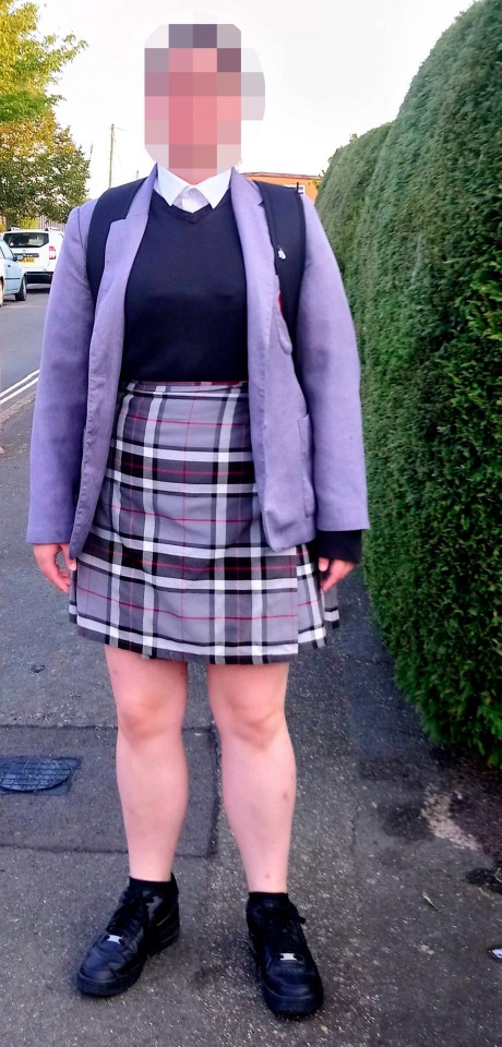 One of the schoolgirls wearing the largest skirt available