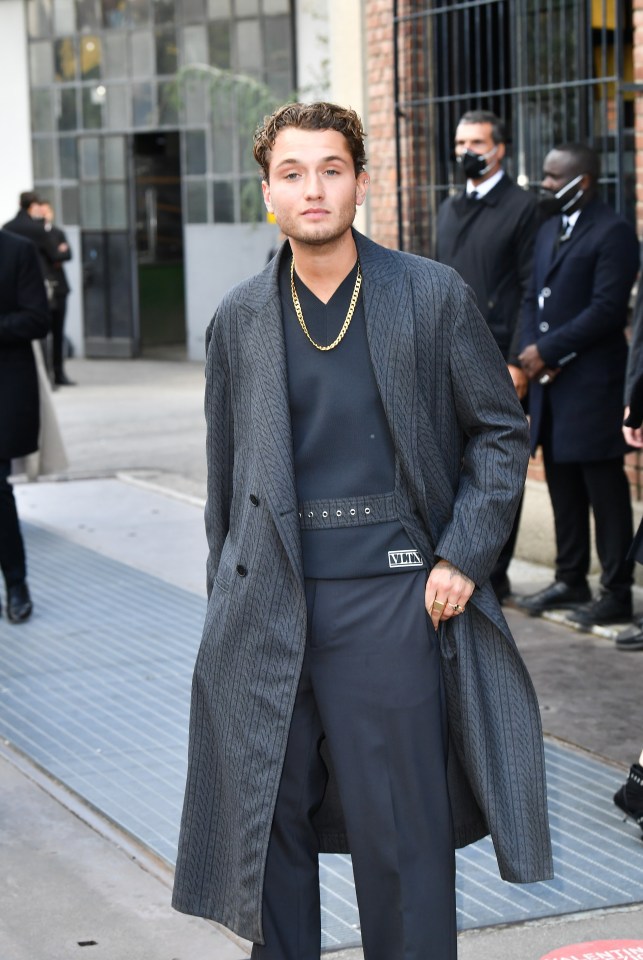 The 23-year-old looked fashionable as he strutted around Milan