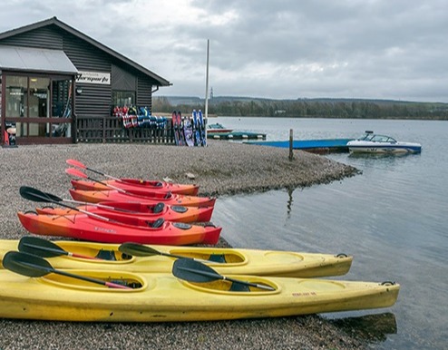 Jump in a canoe, kayak or speedboat at Pine Lakes