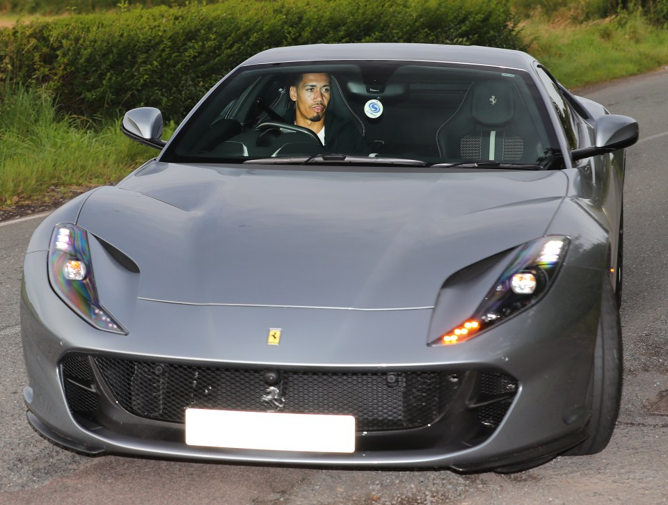 Chris Smalling arrives in his Ferrari 