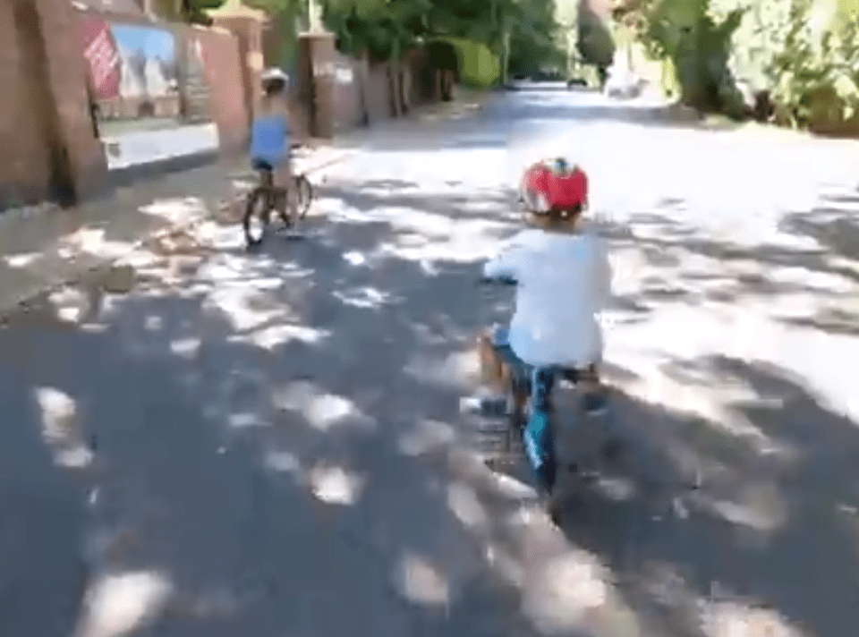 Amelia and Theo can be seen riding their bikes in the sun