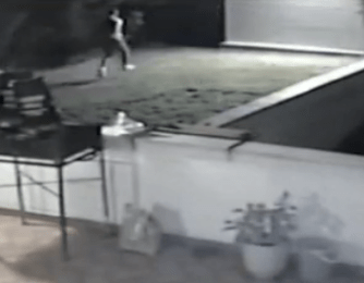 The CCTV footage shows at least three men running towards the large gate and attempting to escape