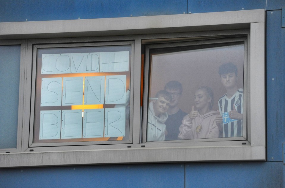 Students leave a sign on their window at Northumbria University