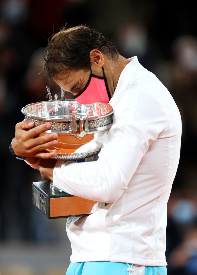 The 34-year-old clutched his favourite trophy to his chest