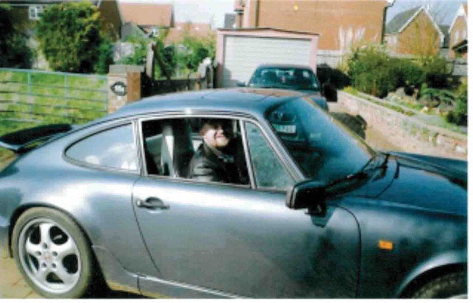 Michael in a Porsche 911 - he spent frittered away his entire fortune on a life of luxury