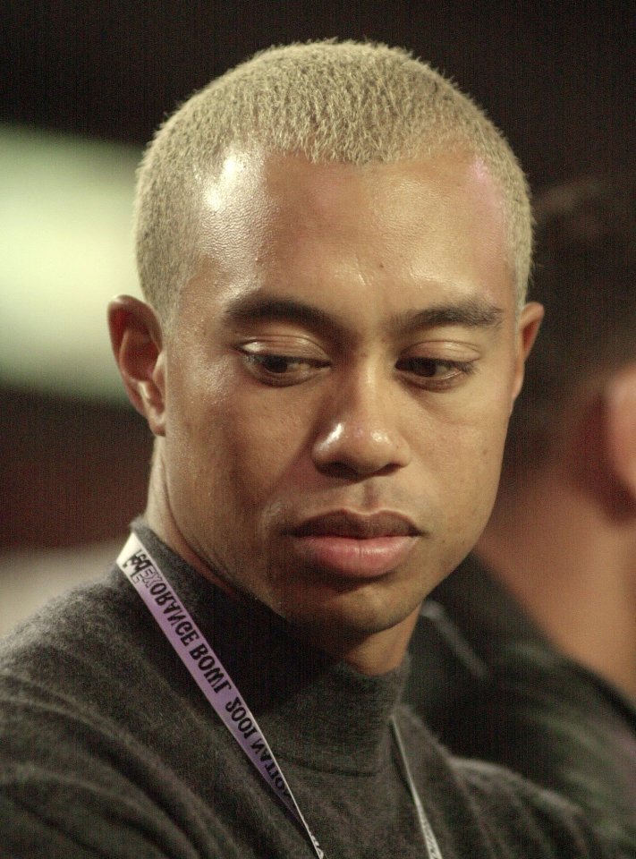 At least Woods' current look is better than this Eminem-inspired do