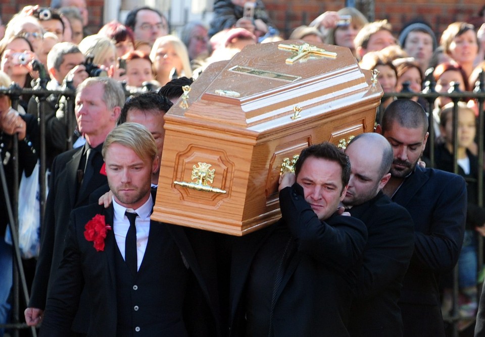 The rest of Boyzone slept beside his coffin the night before his funeral