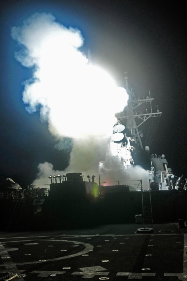 A night-time shot of USS Barry launching a Tomahawk missile for a Navy operation back in 2011