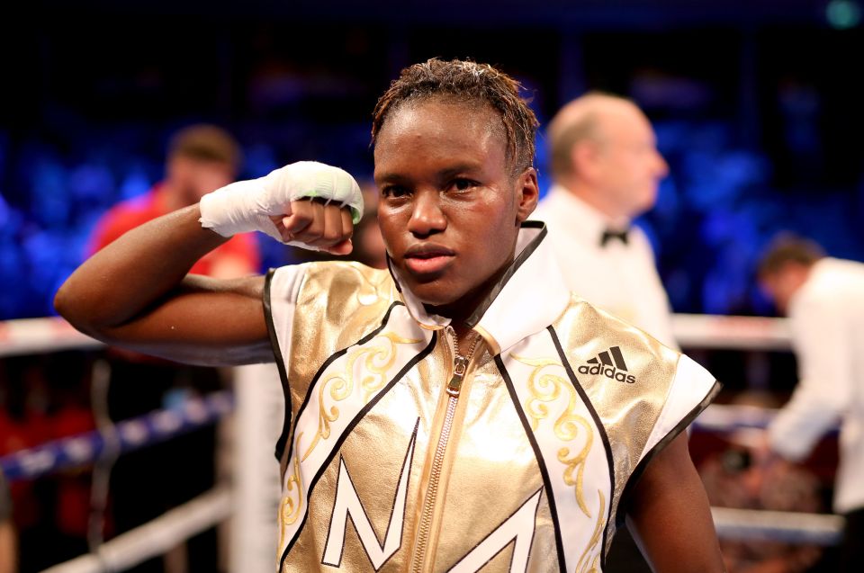 Nicola Adams poses with the belt after a split decision in her WBO World Flyweight Championship