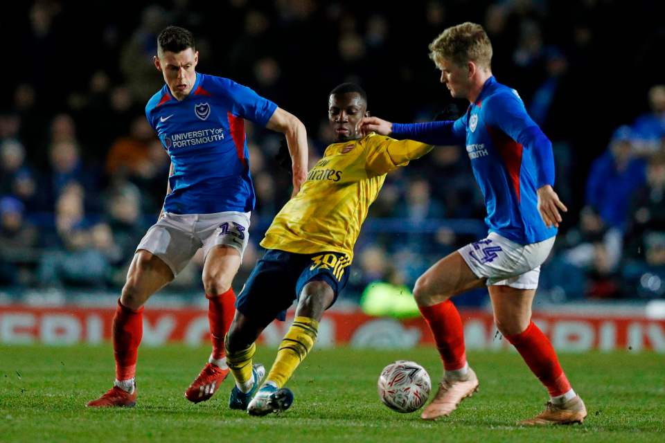 McGeehan takes on Arsenal's Eddie Nketiah while on loan at Portsmouth last season