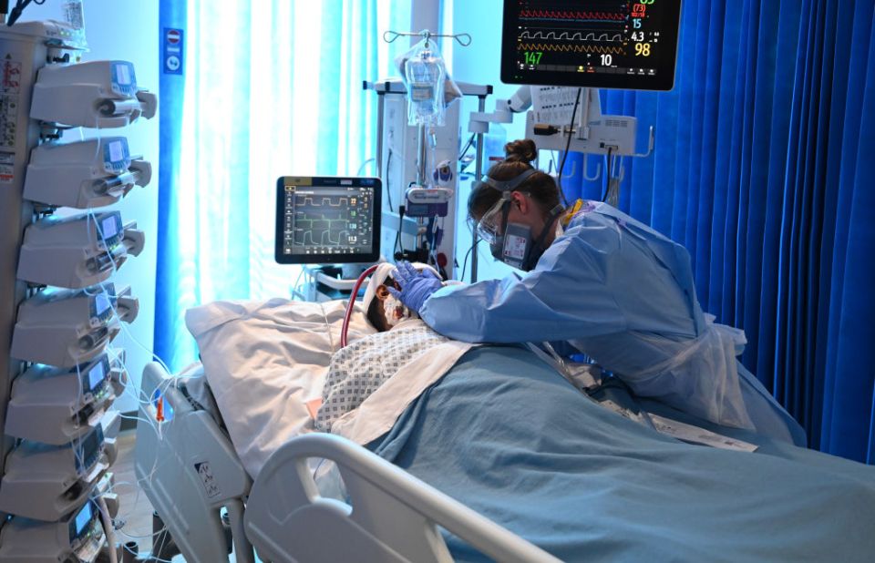 Clinical staff care for a patient at the Intensive Care unit at Royal Papworth Hospital in Cambridge (stock image)