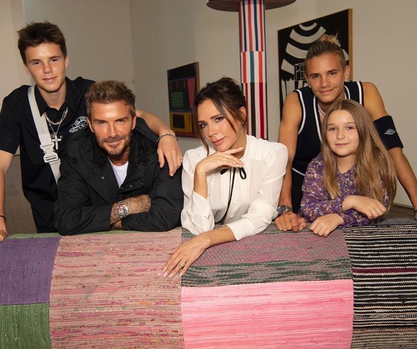 The Beckhams - minus Brooklyn - were all together for Posh's fashion launch