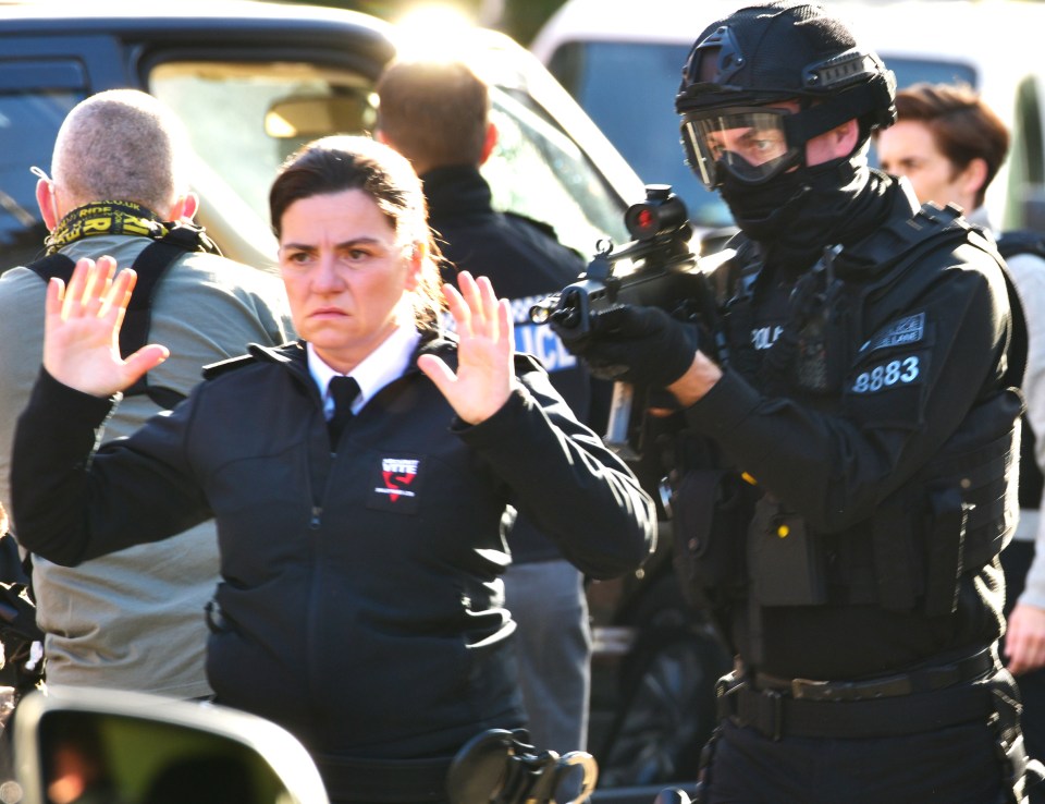 'Hands up!' What did this moody-faced woman do?