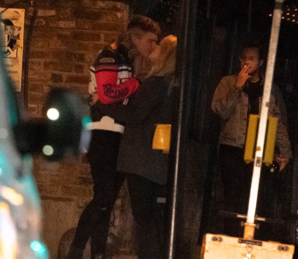 Emily and Charlie kissed outside the pub and then walked to a local shop