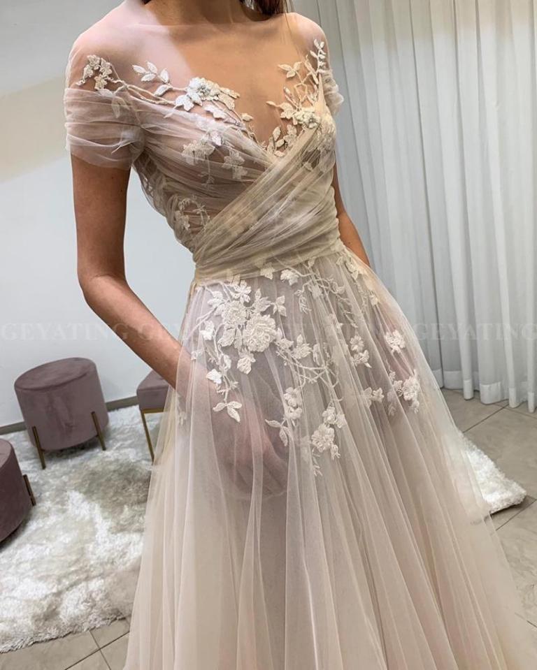 People have pointed out that you can see the bride's nipples in this gown