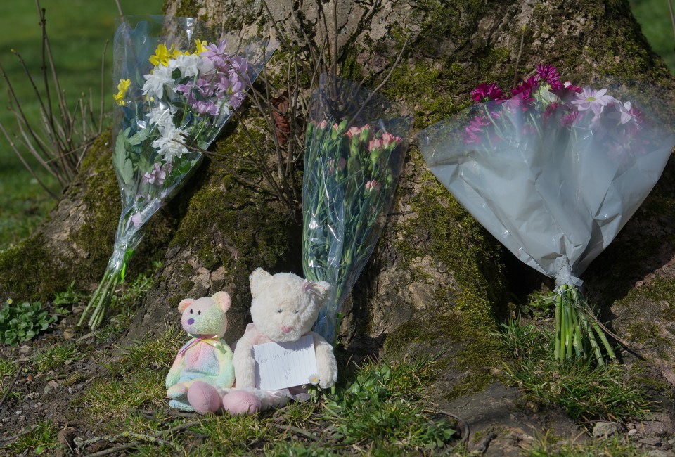 Tributes were left at the scene in the Bolton park