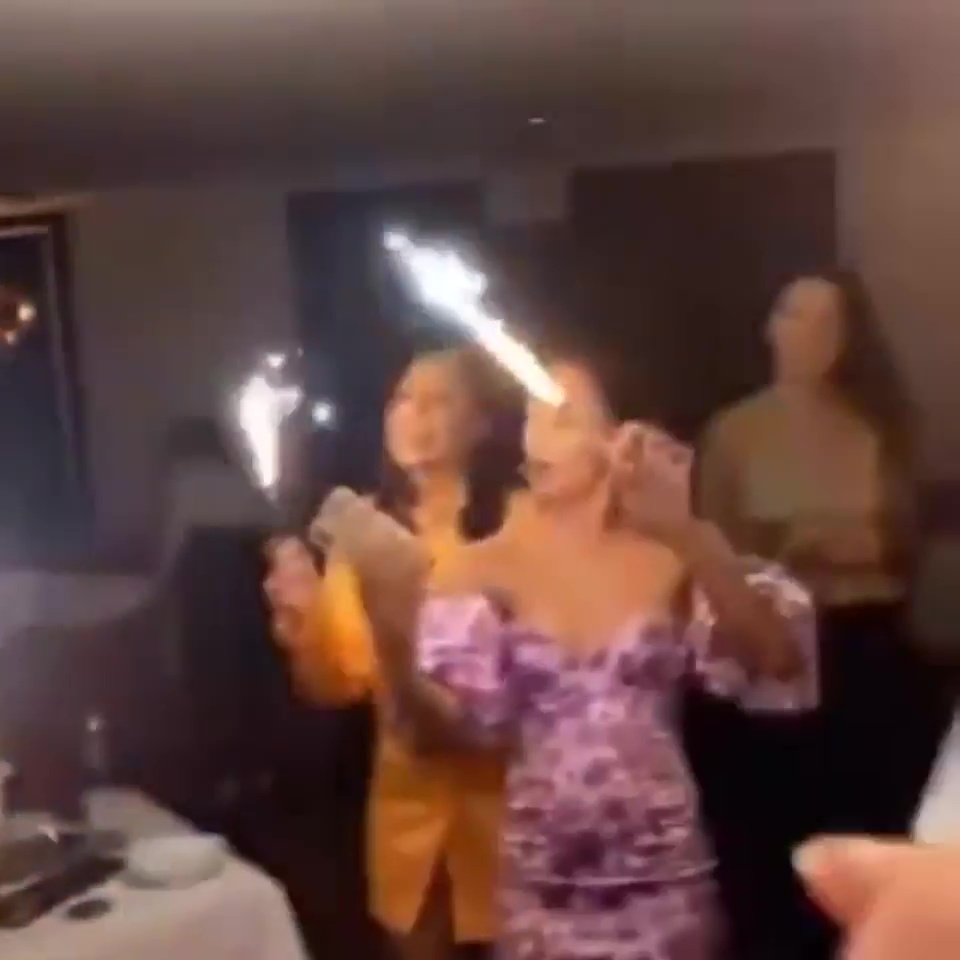 The girls got up to dance and played with sparklers