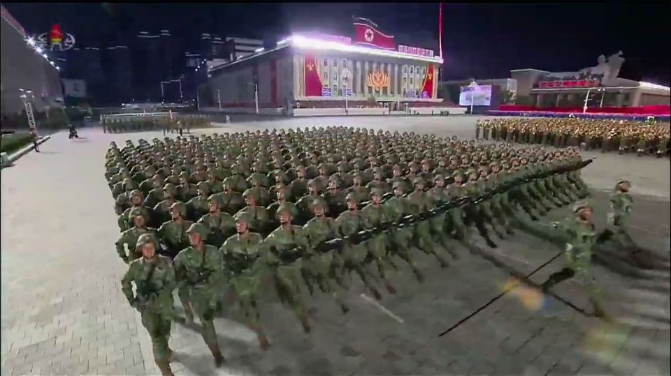 Soldiers marching through the streets 