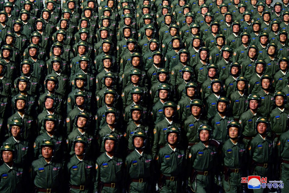 Air force pilots marching during the late night parade