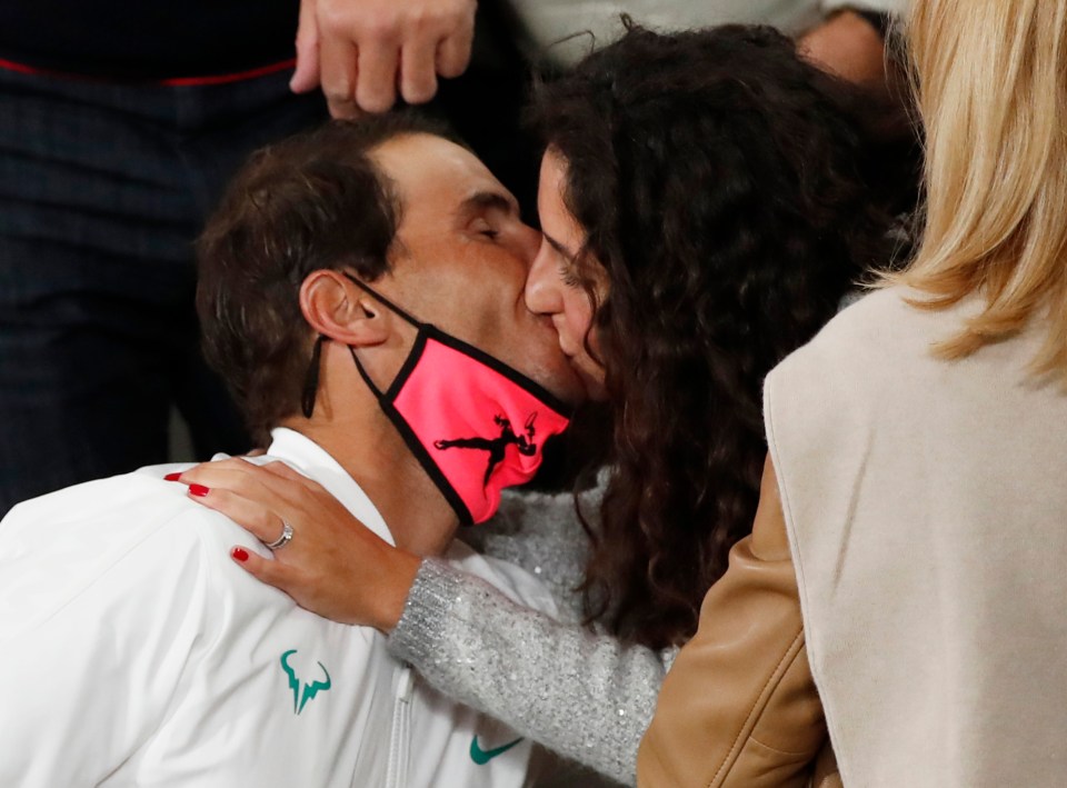 He kissed his wife Maria Francisca Perello who was watching in the stands