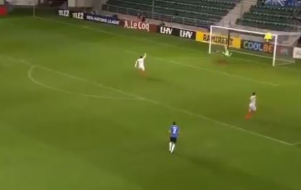 The North Macedonia players prepare to celebrate as the ball goes in