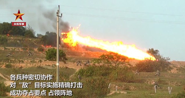 Thousands of airborne and amphibious soldiers are seen attacking an unidentified island with rockets and drones in a video released by CCTV