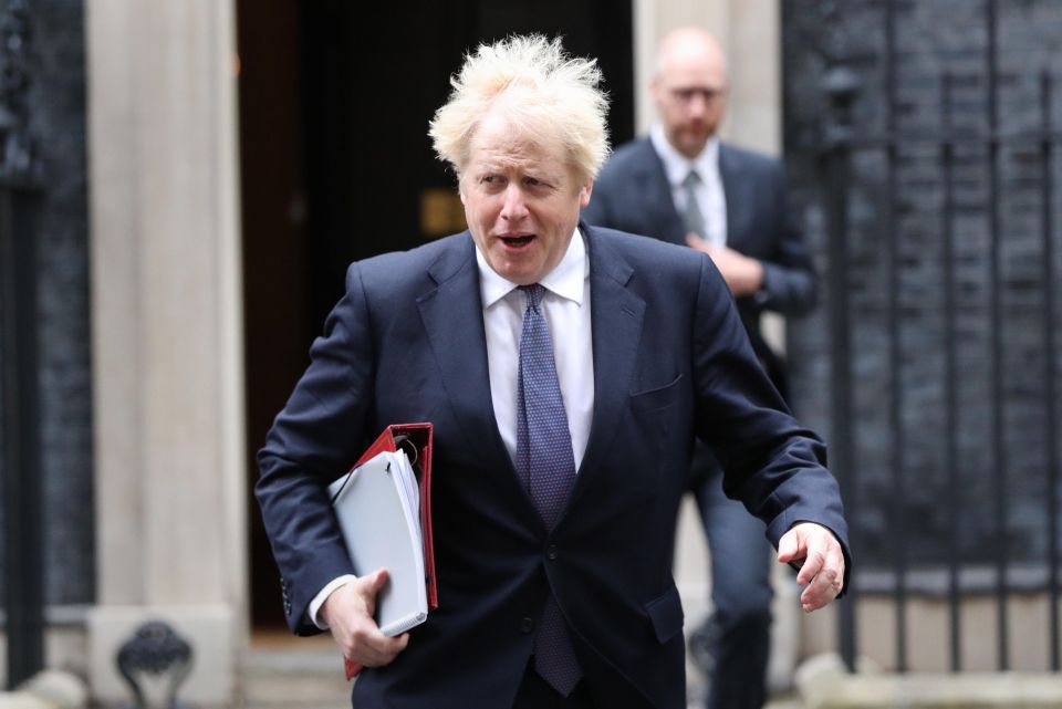 Boris Johnson, seen today at Downing Street, announced the new tier system last night