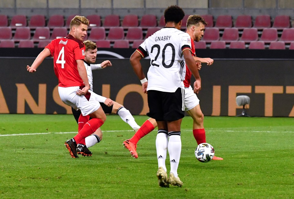 Timo Werner slides the ball in for Germany's first goal