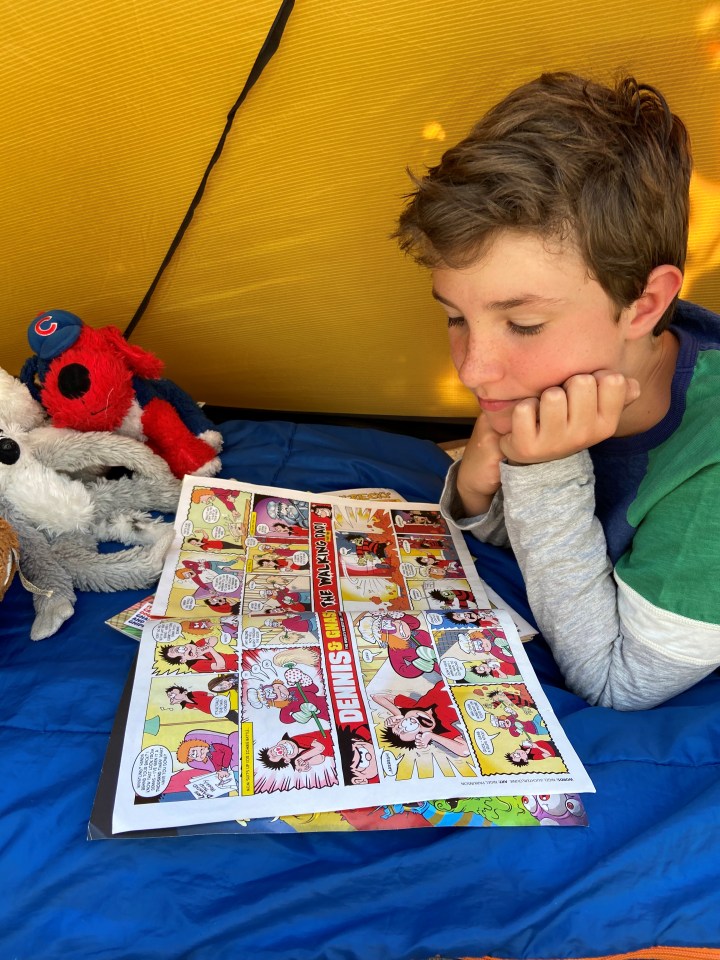 Max Woosey 'reads the Beano for as long as he wants' in his tent at Braunton, Devon