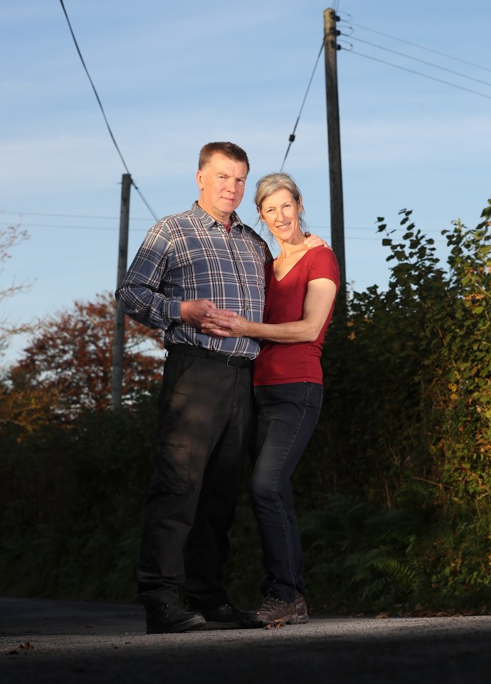 Martin Evans, pictured with wife Keri, has a lifelong obsession with telegraph poles