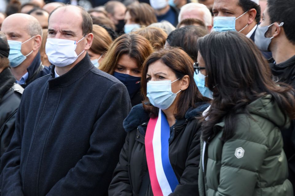 Prime Minister Jean Castex, left, joined tens of thousands at the protest