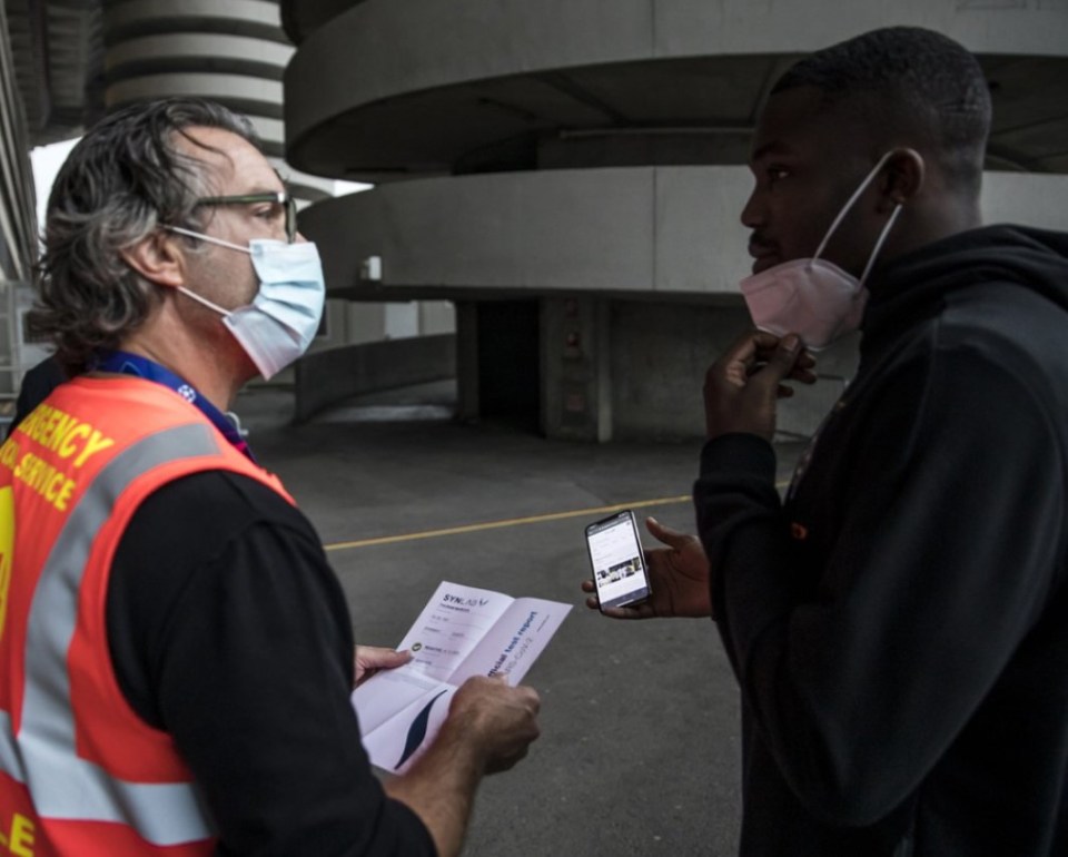 Marcus Thuram tries to show San Siro security who he is