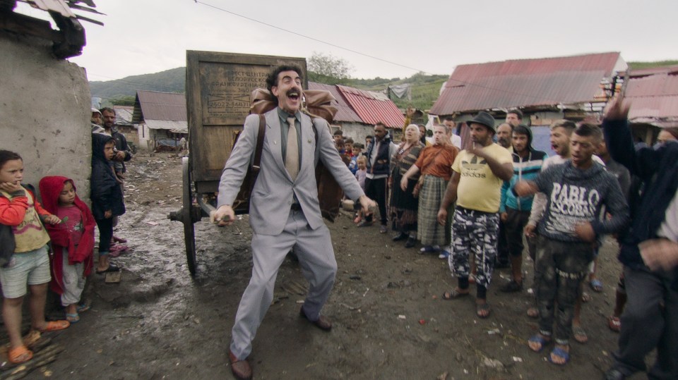 Borat tells his village in Kazakhstan that he is returning to America