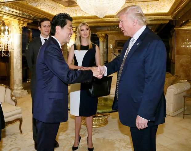 Donald Trump welcoming former Japanese PM Shinzo Abe at the Trump Tower Penthouse