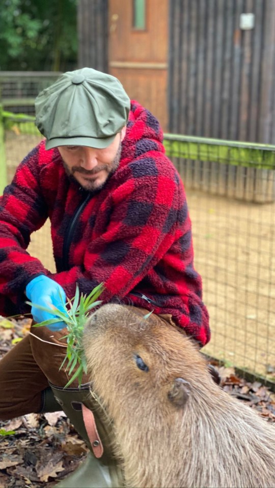 And even got his hands dirty feeding the animals and cleaning up their enclosures