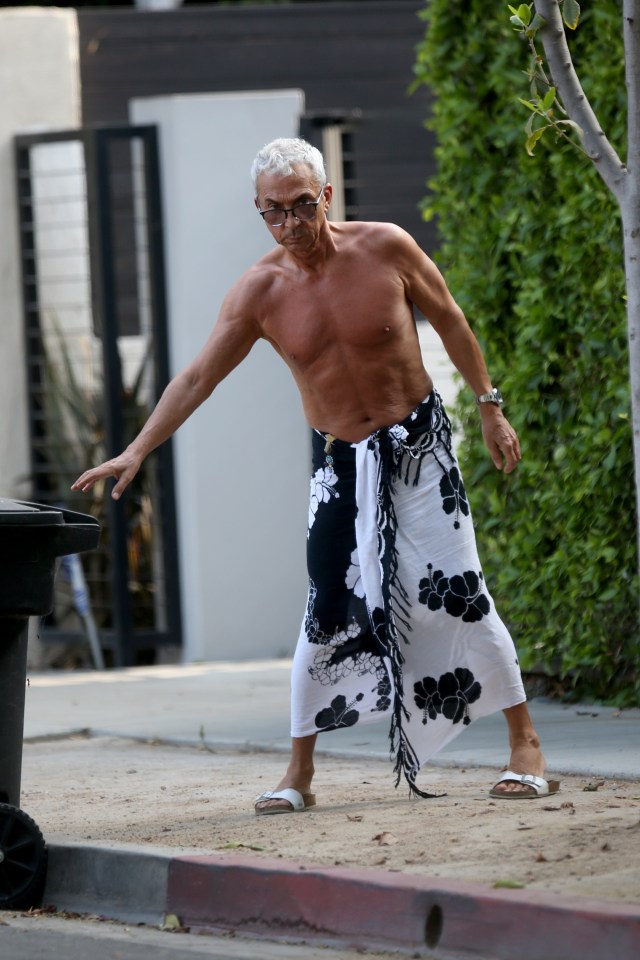 The 64-year-old wore a black and white sarong 