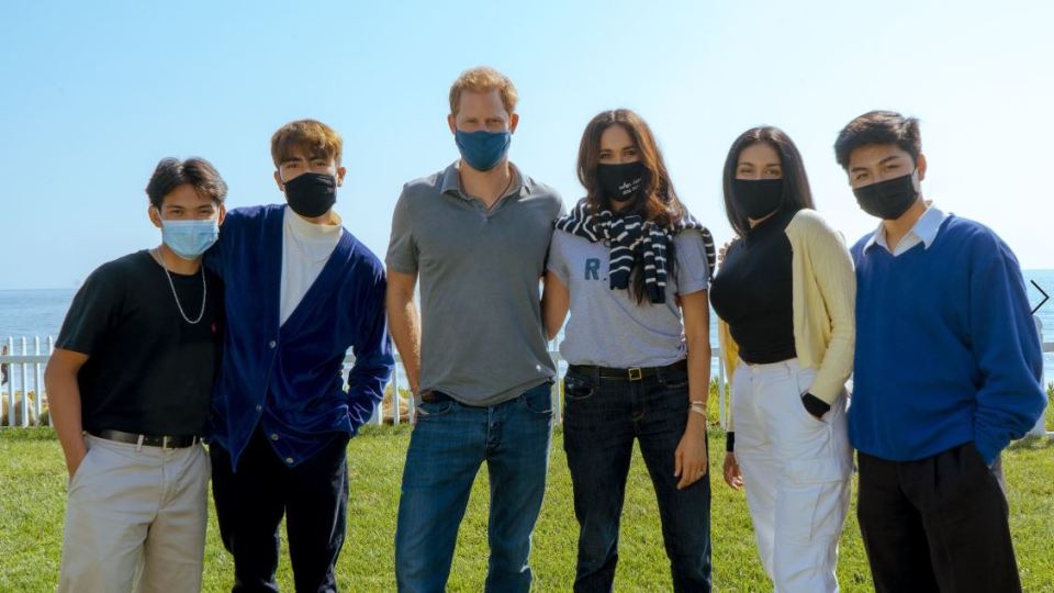 The couple posed with the podcast hosts outside the rented property after the recording