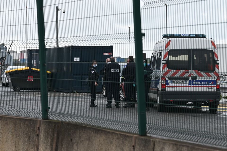 Police at Dunkirk port following the deaths of four migrants in the Channel