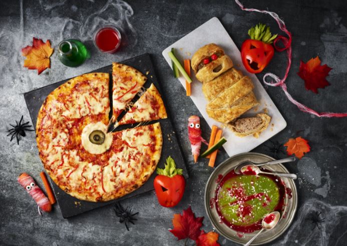 M&S has an eerie selection available this Halloween including "eyeball" pizzas, mummy sausage rolls, and "brain" jelly